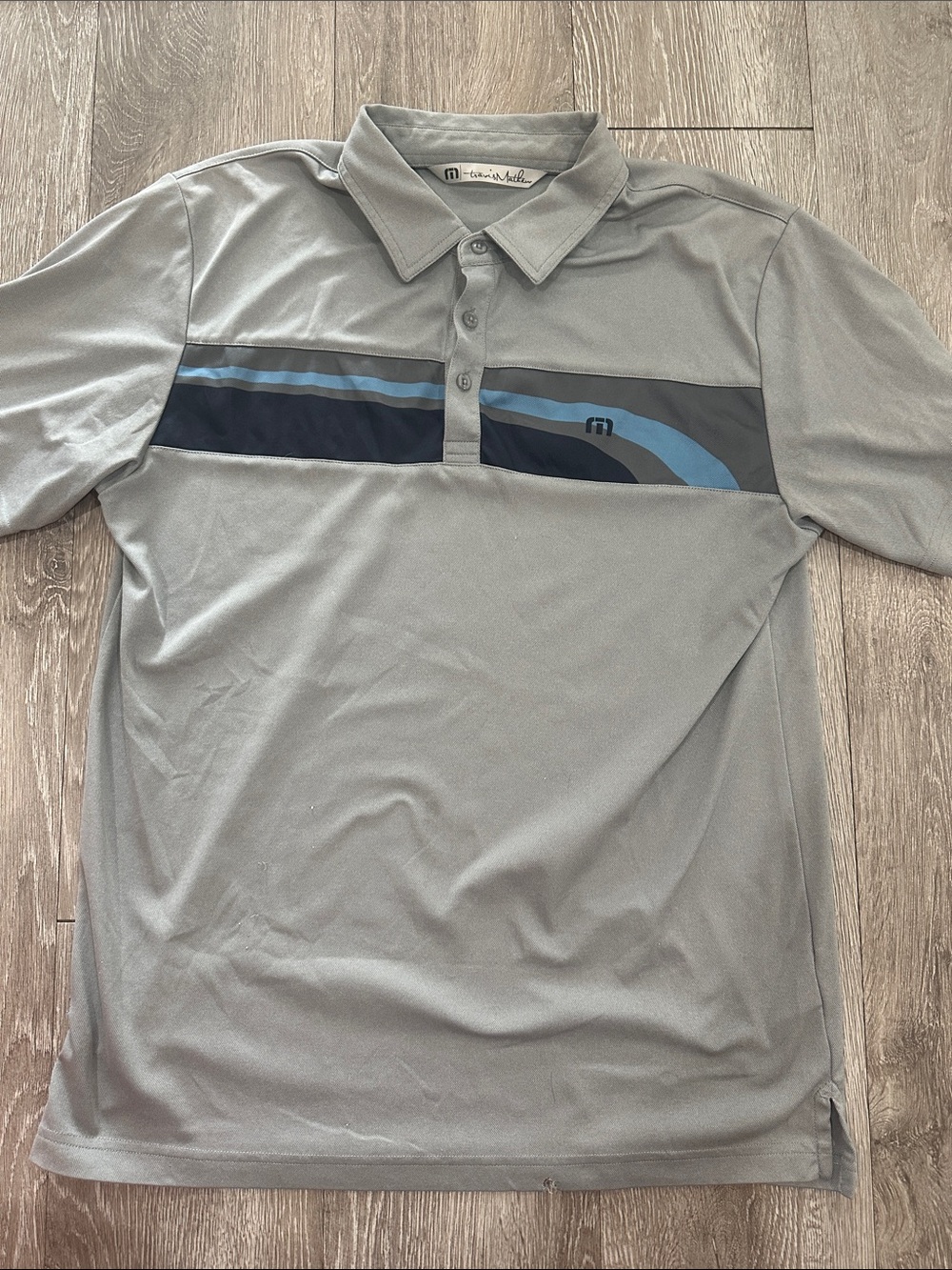 Travis Mathew Light Gray Polo with Navy and Blue Chest Stripes